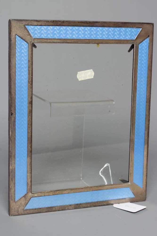 AN ART DECO STYLE SILVER PHOTOGRAPH FRAME by Roberts & Dore Ltd. Image