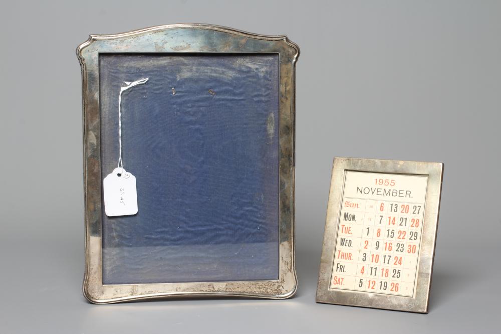 A SILVER PHOTOGRAPH FRAME by Walker & Hall Image