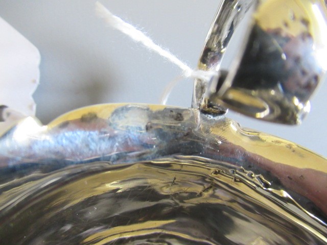 A GEORGE III SMALL SILVER SAUCEBOAT by Samuel James Image
