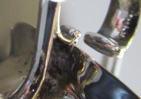 A GEORGE III SMALL SILVER SAUCEBOAT by Samuel James Image