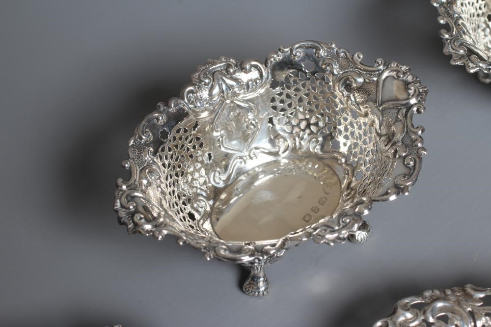 A SET OF FOUR LATE VICTORIAN SILVER BON-BON DISHES by Deakin & Francis Image
