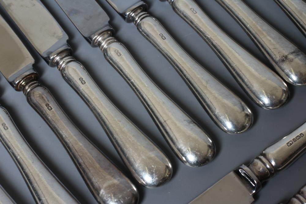 A SET OF SIXTEEN OLD ENGLISH PATTERN SILVER HANDLED DESSERT KNIVES by William Yates Ltd., Sheffield Image