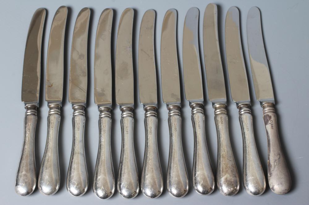 A SET OF ELEVEN OLD ENGLISH PATTERN SILVER HANDLED TABLE KNIVES by William Yates Ltd., Sheffield Image