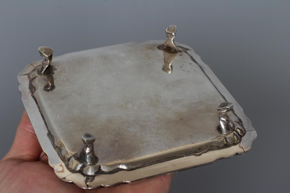 A COLLECTION OF INDIAN COLONIAL SILVER comprising an oblong cigarette box engraved with a Image