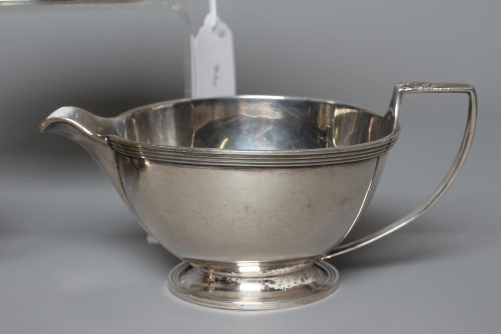 A THREE PIECE SILVER TEA SERVICE by D & J Wellby Ltd. Image