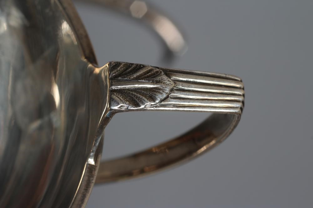 A THREE PIECE SILVER TEA SERVICE by D & J Wellby Ltd. Image