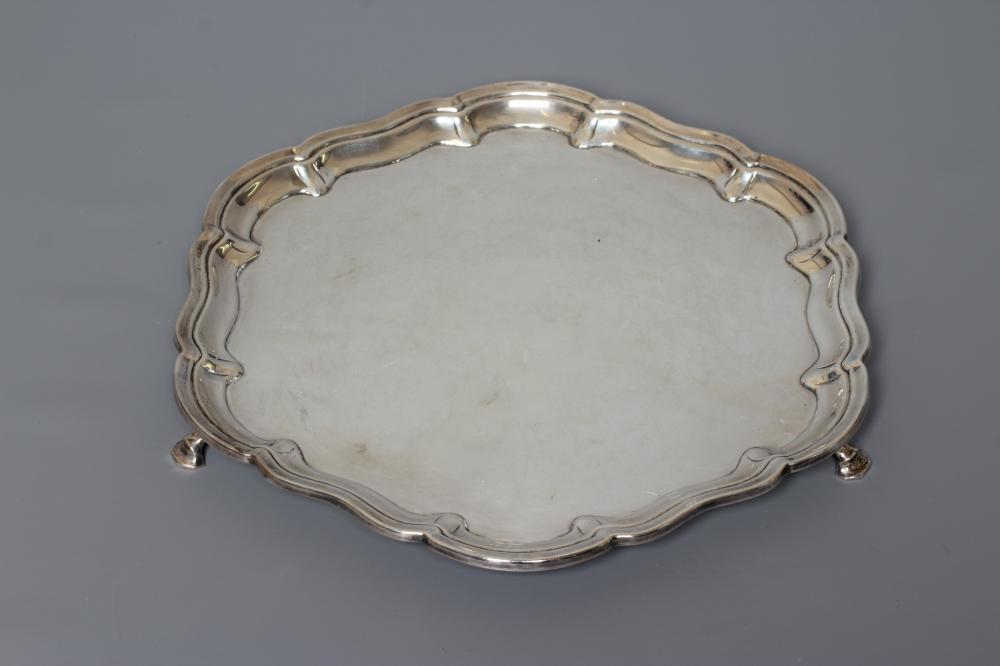 A SILVER SALVER by W & C Sissons, Sheffield 1935 Jubilee mark, of lobed circular form with pie-crust Image