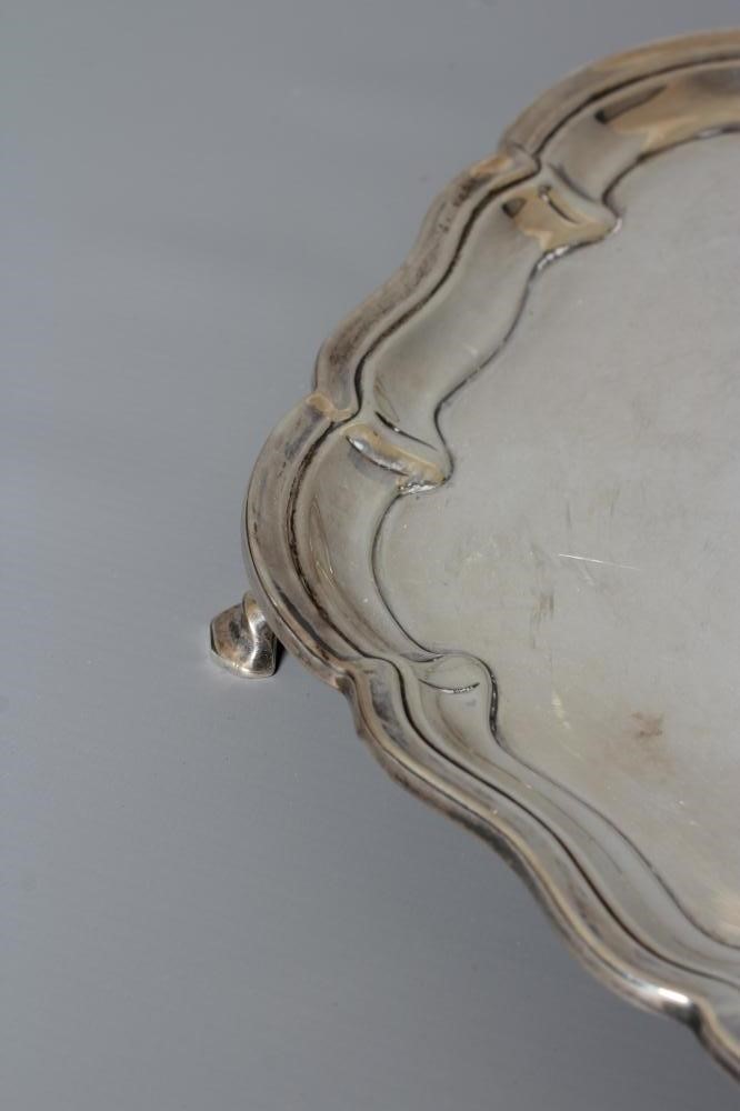 A SILVER SALVER by W & C Sissons, Sheffield 1935 Jubilee mark, of lobed circular form with pie-crust Image