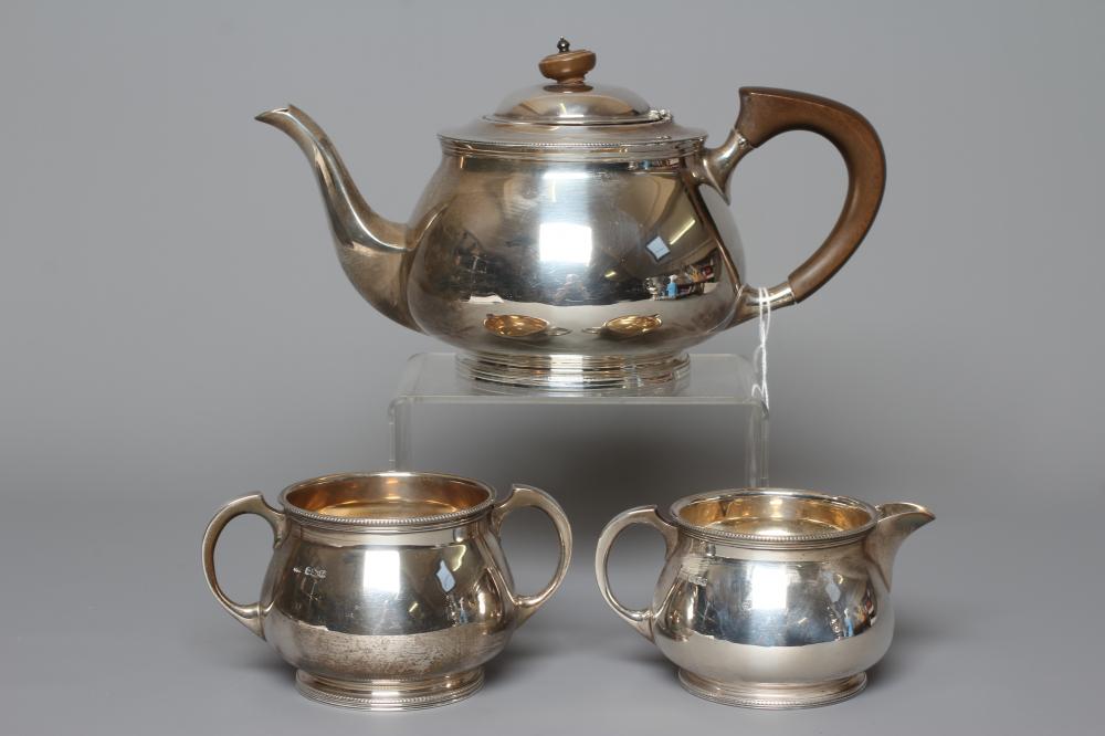 A COMPOSITE THREE PIECE SILVER TEA SERVICE by Mappin & Webb Image