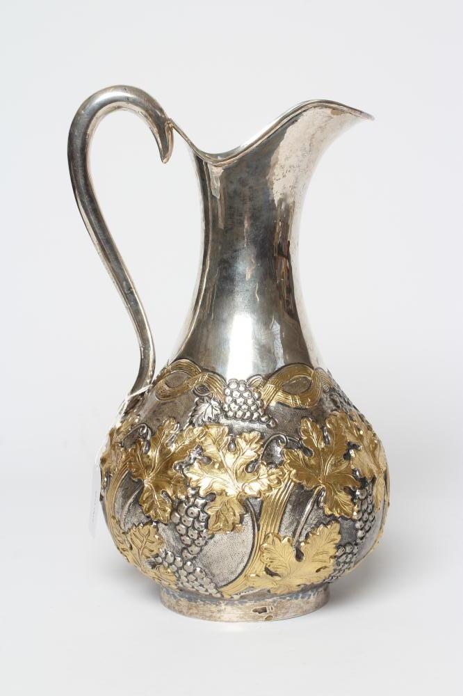 A SILVER WINE EWER Image