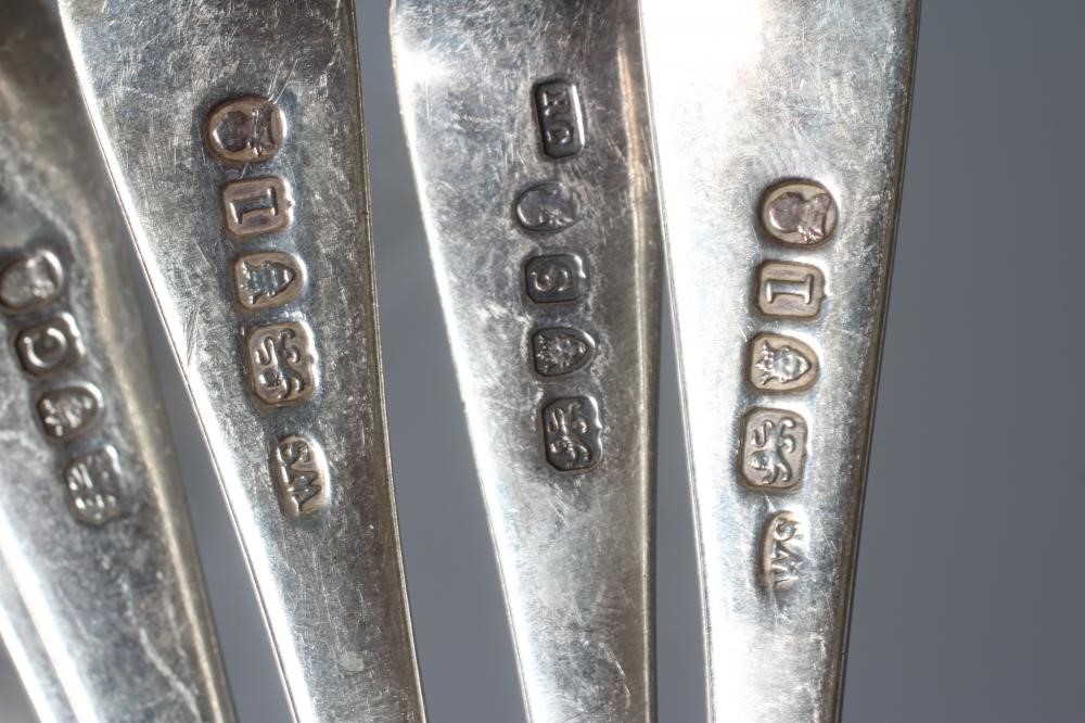 A COMPOSITE SET OF TEN GEORGE III SILVER OLD ENGLISH PATTERN DESSERT SPOONS including five by Image