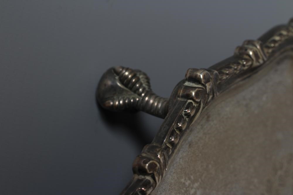 AN EDWARDIAN SILVER SALVER by Hawksworth Image