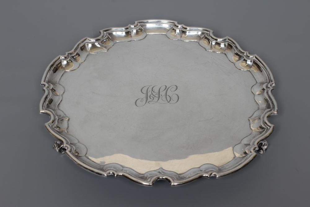 AN EDWARDIAN SILVER SALVER by James Dixon & Sons Ltd. Image