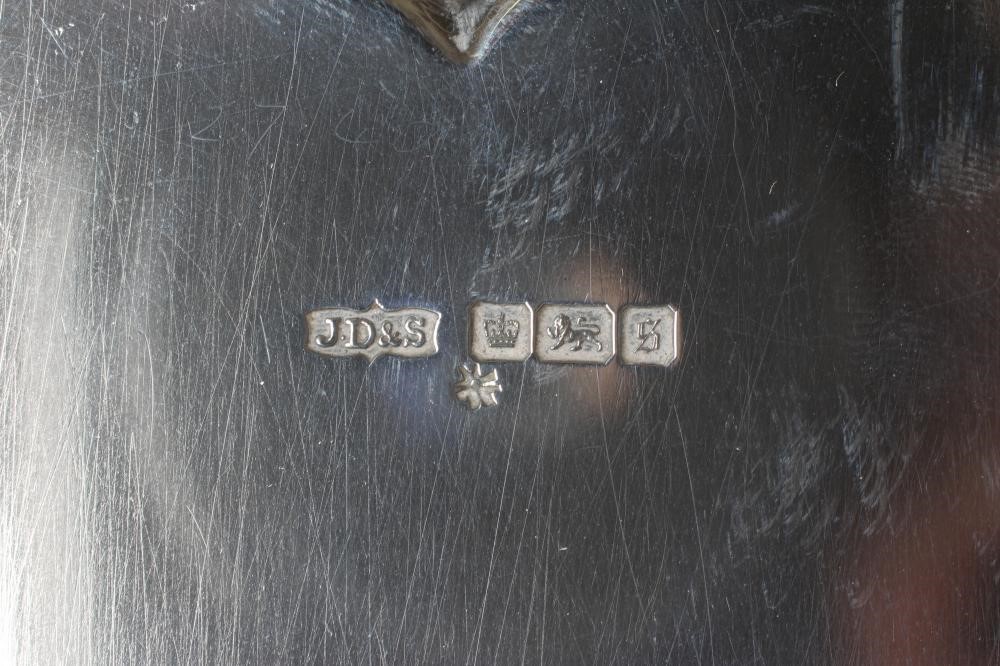 AN EDWARDIAN SILVER SALVER by James Dixon & Sons Ltd. Image