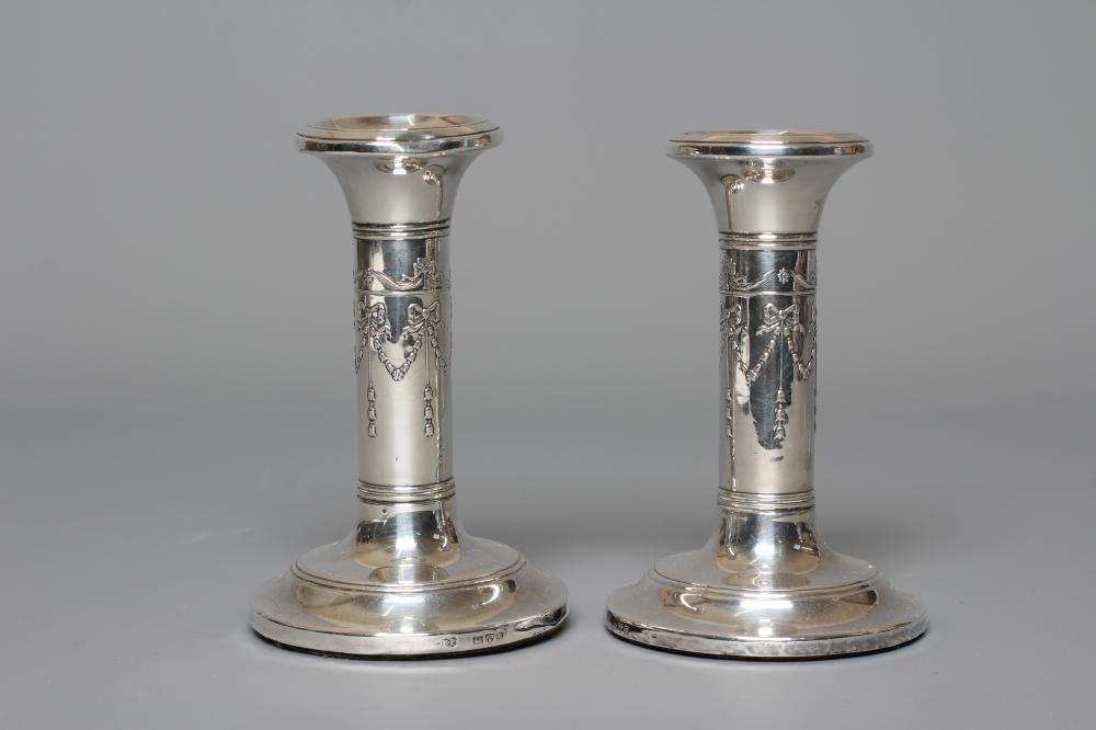 A PAIR OF EDWARDIAN SILVER SMALL CANDLESTICKS by Robert Pringle & Sons Image