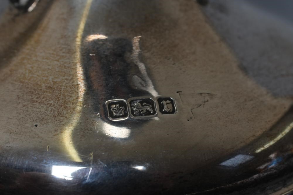 AN EDWARDIAN SILVER VASE by Walker and Hall Image