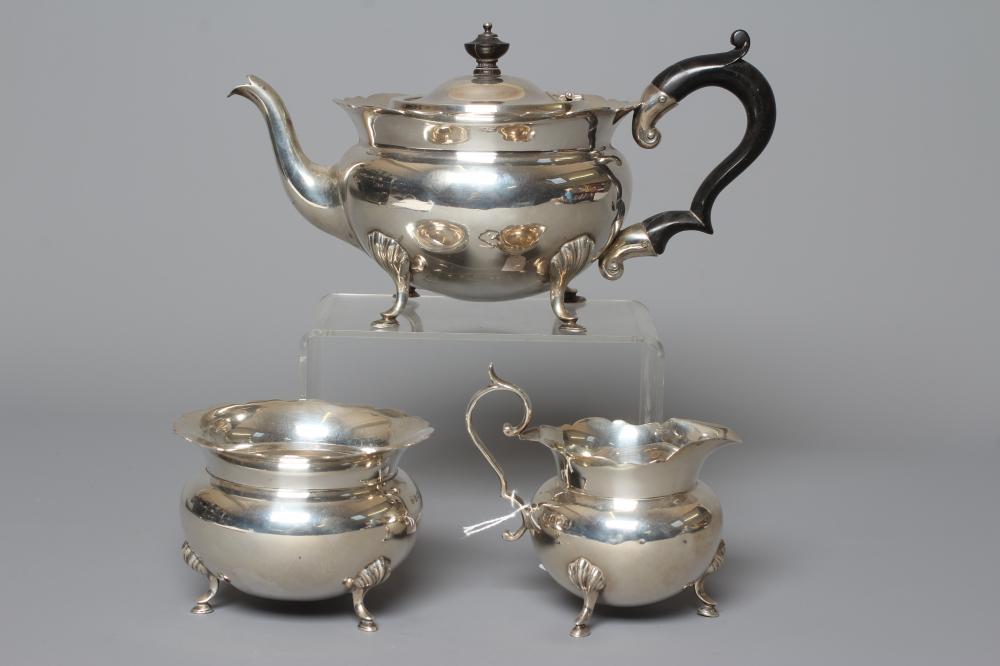 AN EDWARDIAN SILVER THREE PIECE TEA SERVICE by J Sherwood & Sons Image