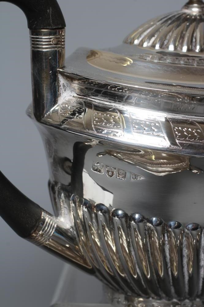 A COMPOSITE LATE VICTORIAN/EDWARDIAN SILVER FOUR PIECE TEA AND COFFEE SERVICE by Walker & Hall Image