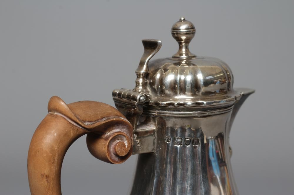 AN EDWARDIAN SILVER HOT MILK JUG by Lambert & Co. Image