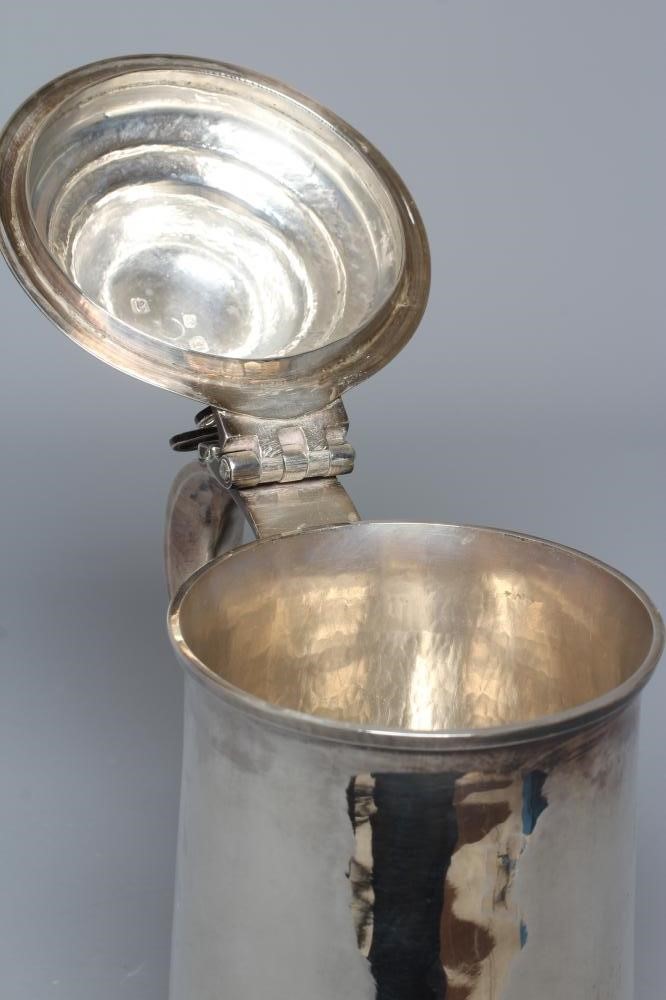 A GEORGE III TANKARD by John Denzilow Image