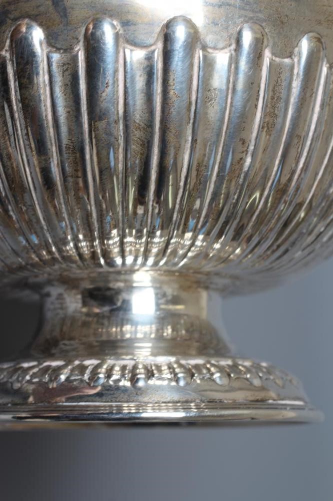 A LATE VICTORIAN SILVER SMALL ROSE BOWL by W & G Sissons, London 1898, of semi-fluted circular form Image