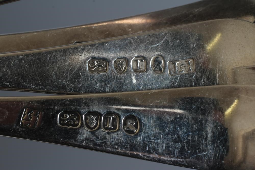 A COMPOSITE SET OF ELEVEN GEORGE III SILVER OLD ENGLISH PATTERN TABLE SPOONS including five by Image