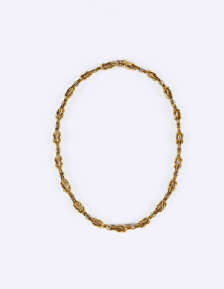 A ROBERT COIN TWO TONE REEF KNOT CHOKER with slide clasp and safety clip, stamped 750, 1226VI, 46.7g Image