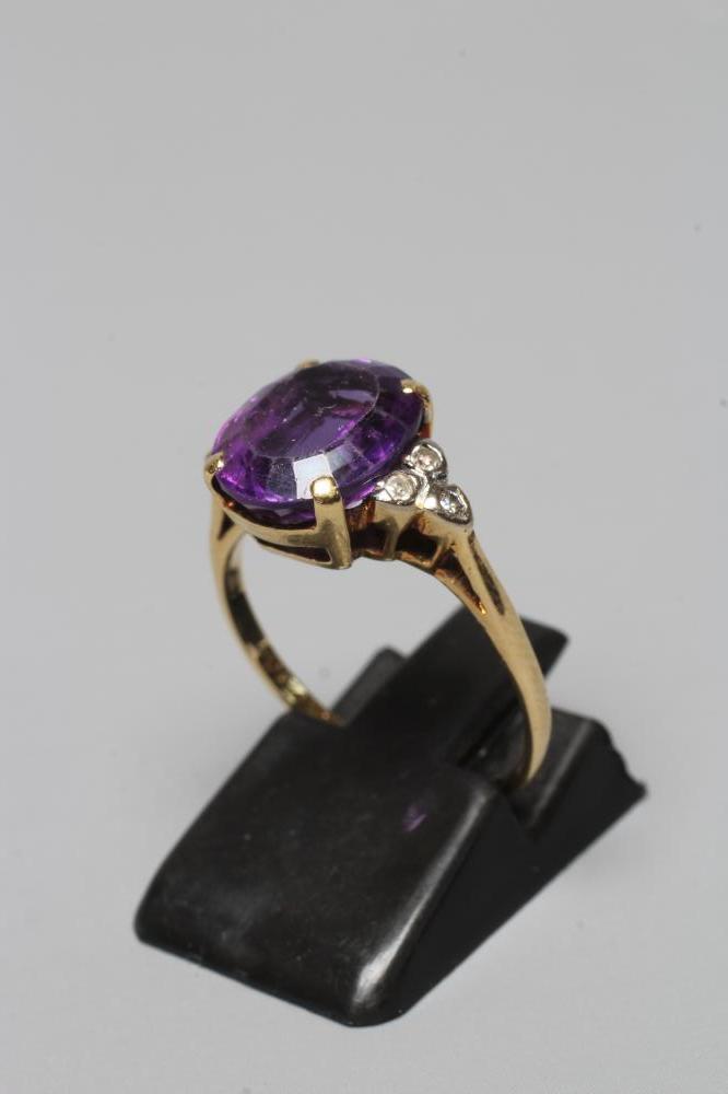AN AMETHYST AND DIAMOND DRESS RING Image