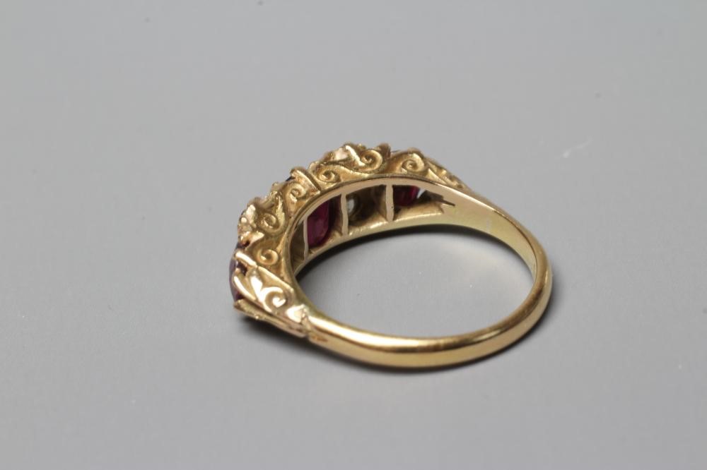 A LATE VICTORIAN THREE STONE RUBY RING Image