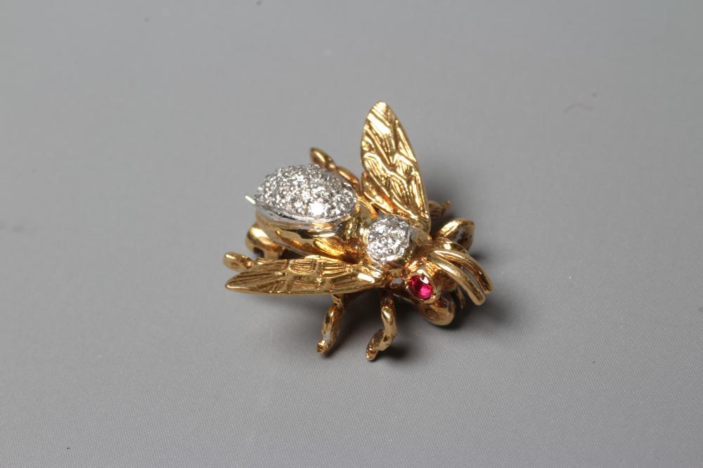 AN 18CT GOLD NOVELTY INSECT BROOCH set with two facet cut ruby eyes and with pave set diamonds to Image