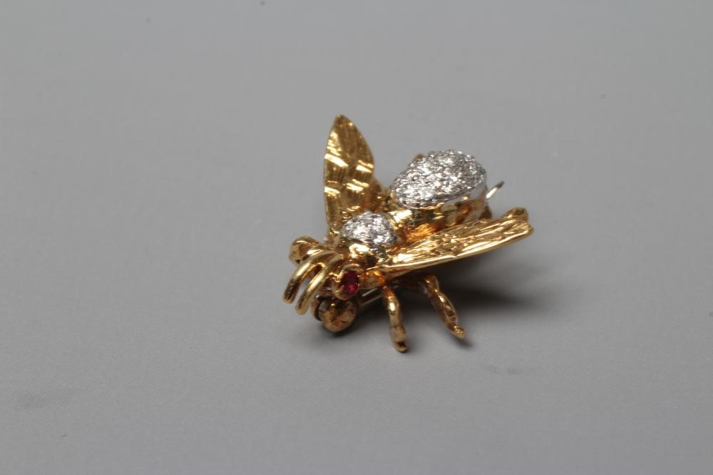 AN 18CT GOLD NOVELTY INSECT BROOCH set with two facet cut ruby eyes and with pave set diamonds to Image