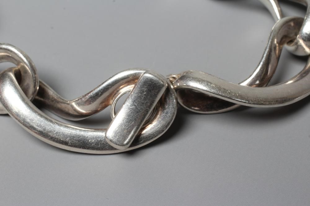 A GEORG JENSEN SILVER INFINITY BRACELET designed by Regitze Overgaard, No. 452, London 2011, 74.8g Image