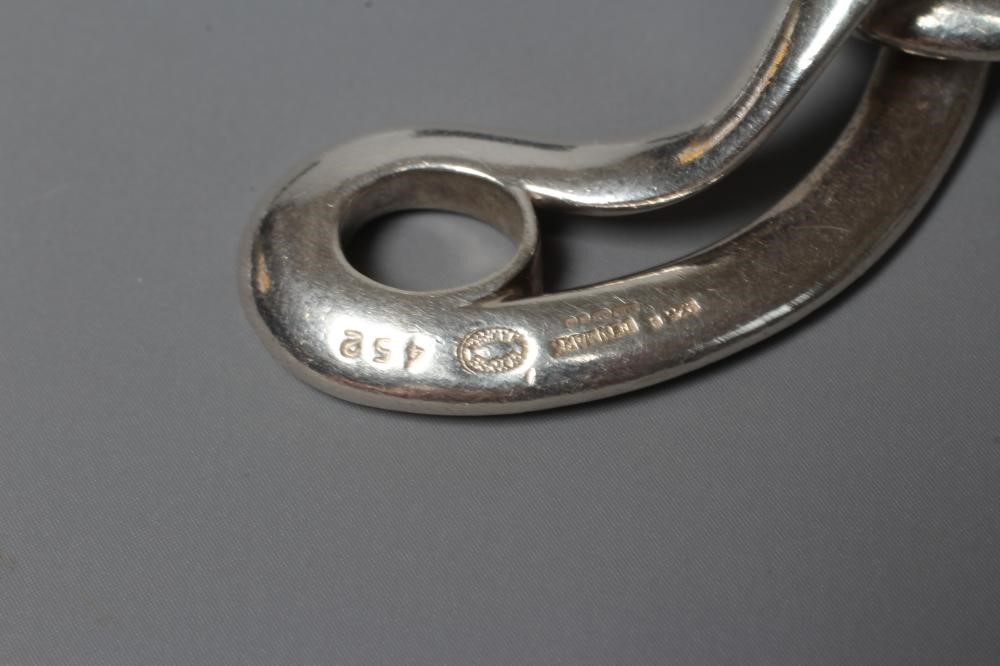 A GEORG JENSEN SILVER INFINITY BRACELET designed by Regitze Overgaard, No. 452, London 2011, 74.8g Image