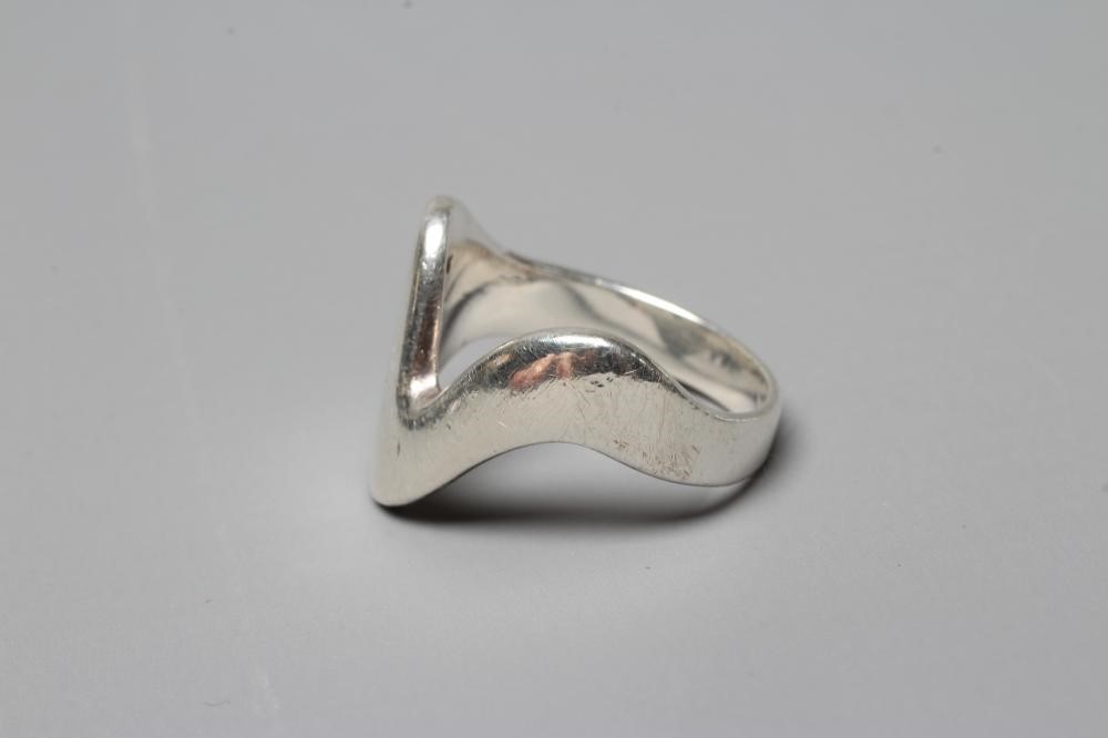A GEORG JENSEN SILVER MODERNIST RING designed by Ole Ishøj, no.A77B, size O 1/2 (Est. plus 24% Image