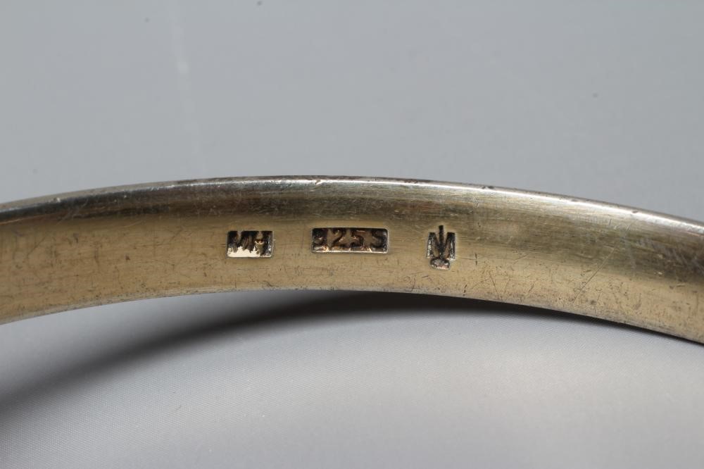 A NORWEGIAN SILVER GILT BANGLE BY MARIUS HAMMER with orange guilloche enamelling, stamped 925S, MH Image