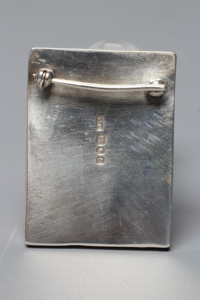 ANNO DOMINI - an Ann O'Donnell silver mounted oblong polished 'landscape agate' brooch, London 1979, Image