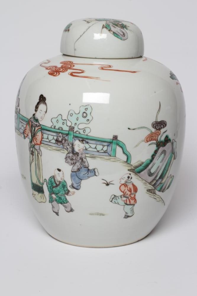 A CHINESE PORCELAIN FAMILLE VERTE LARGE JAR AND COVER painted with four ladies and eight children at Image