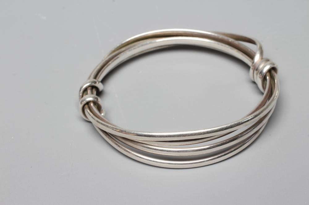 A SILVER TWIST BANGLE AND MATCHING RING possibly by Jordan Cliffe, unmarked (Est. plus 24% premium Image