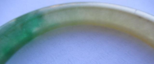 A CHINESE POLISHED JADE BANGLE of D form, 37g, together with a silver mounted jade Shou pendant, Image