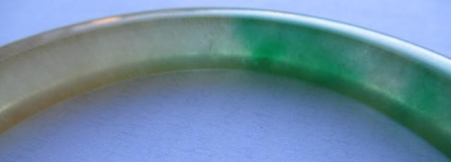 A CHINESE POLISHED JADE BANGLE of D form, 37g, together with a silver mounted jade Shou pendant, Image