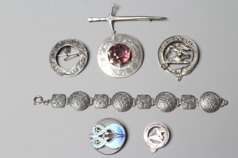A COLLECTION OF SCOTTISH SILVER JEWELLERY comprising a John Hart Iona Graham clan badge Image