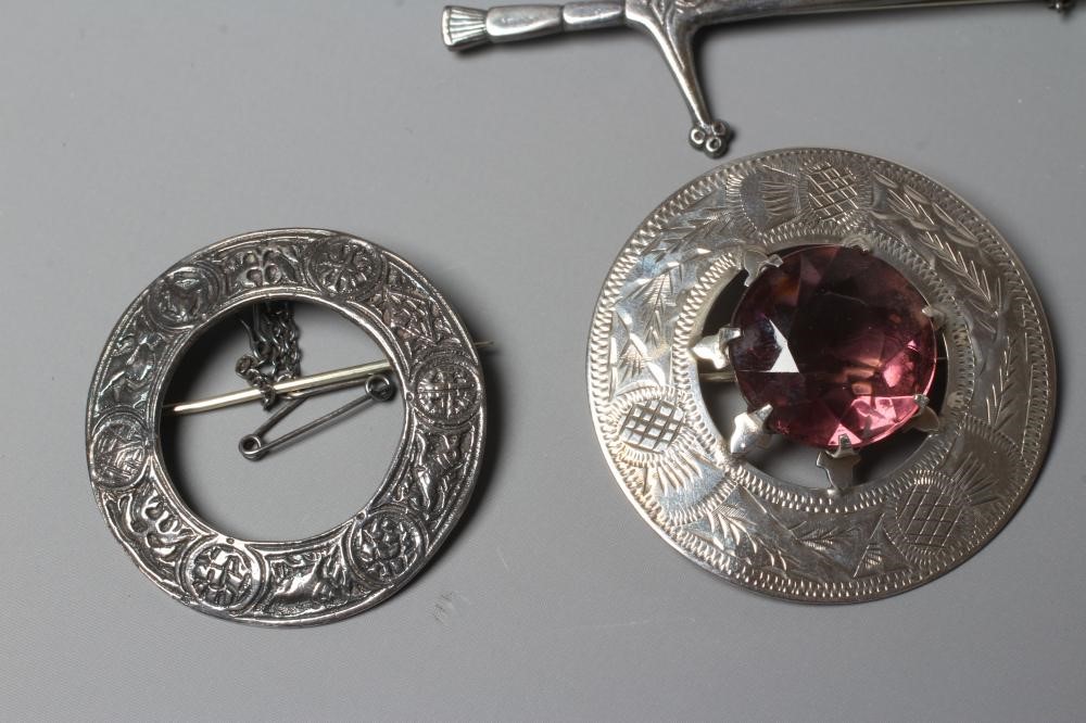 A COLLECTION OF SCOTTISH SILVER JEWELLERY comprising a John Hart Iona Graham clan badge Image