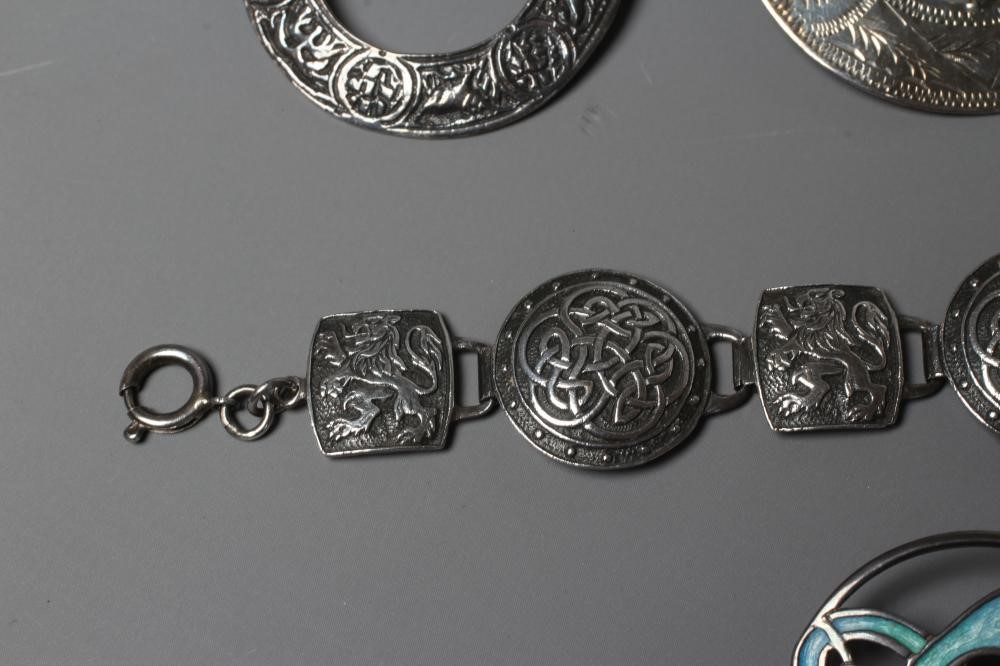 A COLLECTION OF SCOTTISH SILVER JEWELLERY comprising a John Hart Iona Graham clan badge Image