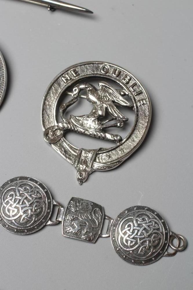 A COLLECTION OF SCOTTISH SILVER JEWELLERY comprising a John Hart Iona Graham clan badge Image