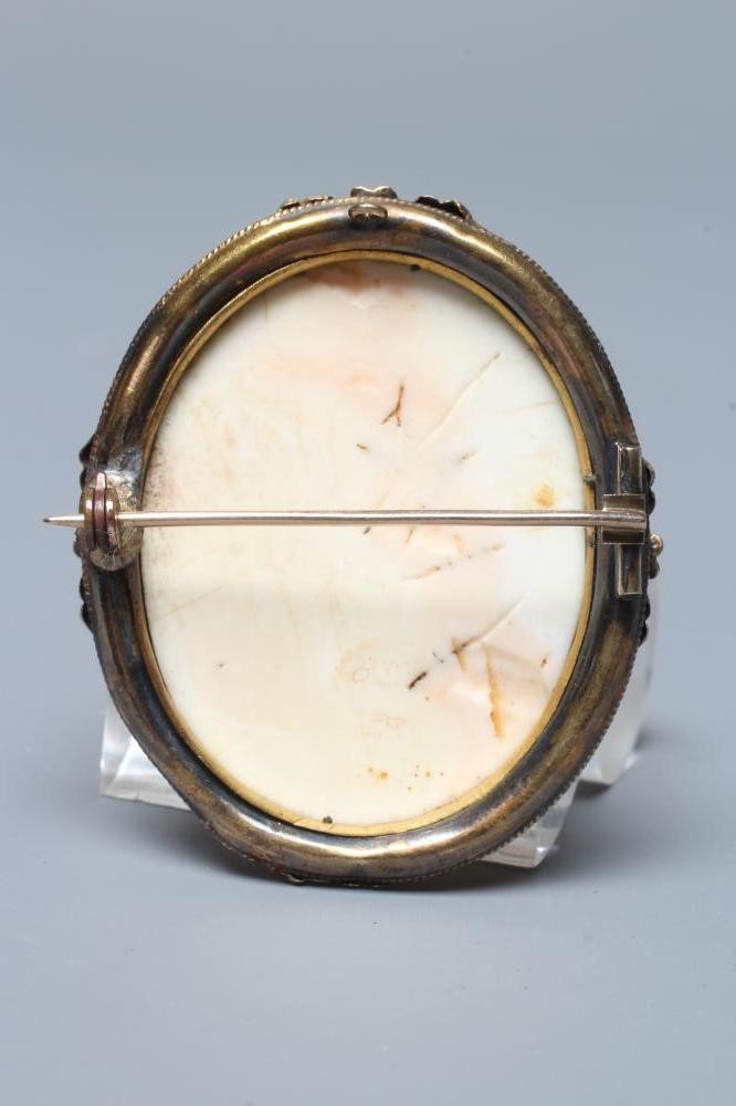 A VICTORIAN PINK AND WHITE SHELL CAMEO carved in high relief with the head and shoulders portrait of Image