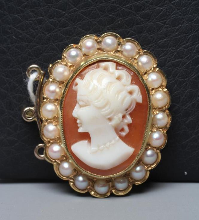 A SHELL CAMEO NECKLACE CLASP from a triple strand necklace Image