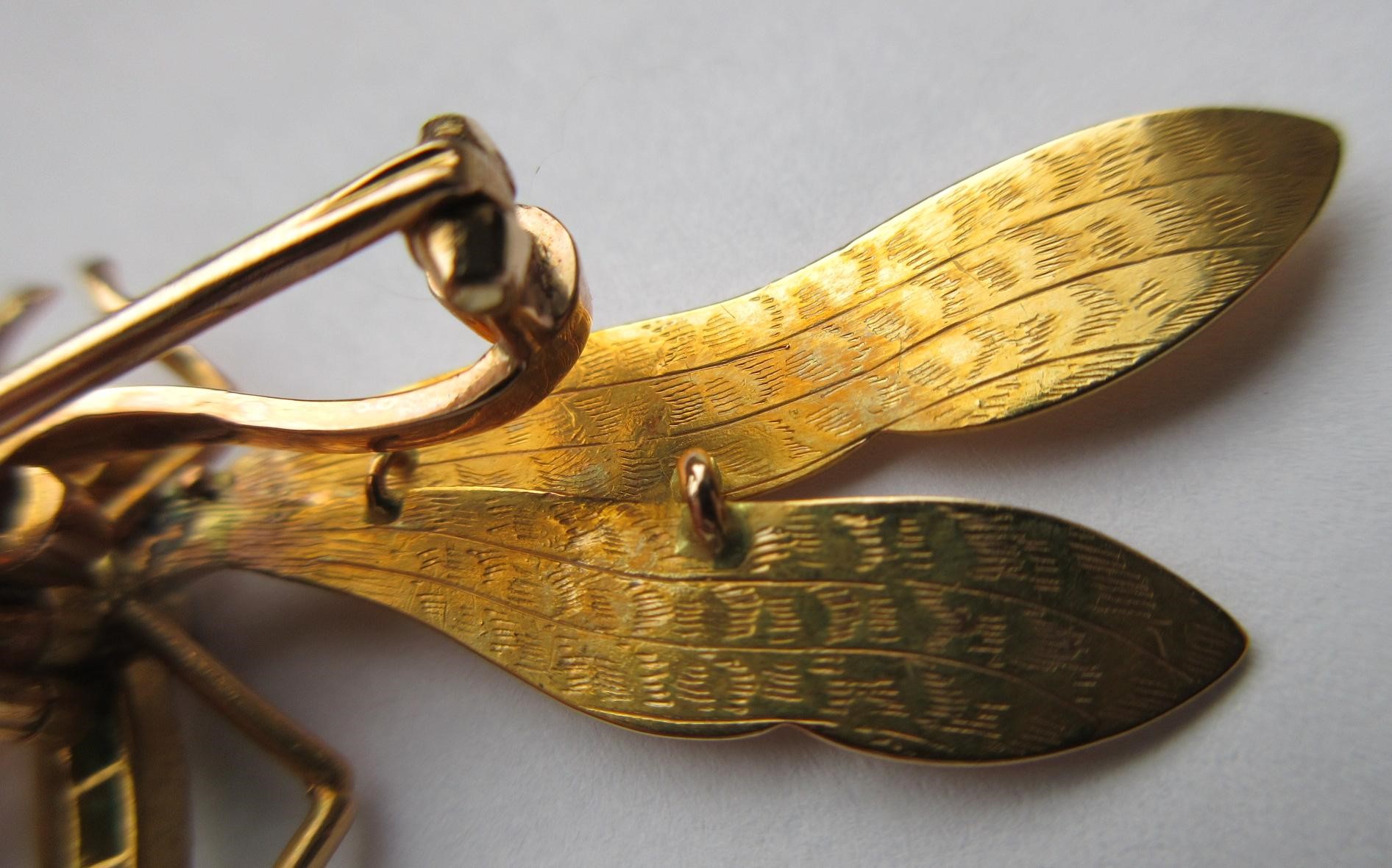 A DRAGONFLY BROOCH with engraved wings Image
