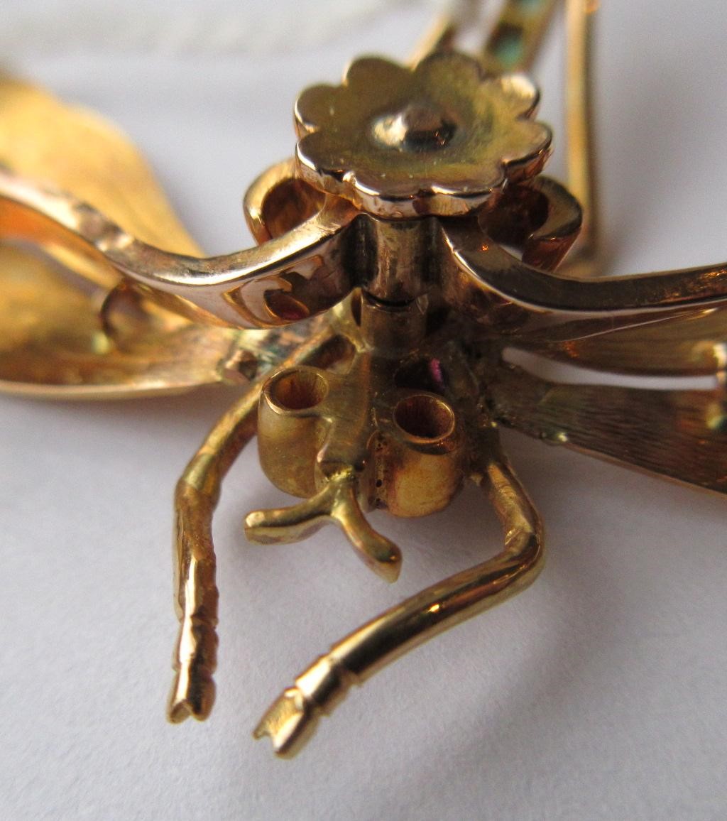 A DRAGONFLY BROOCH with engraved wings Image
