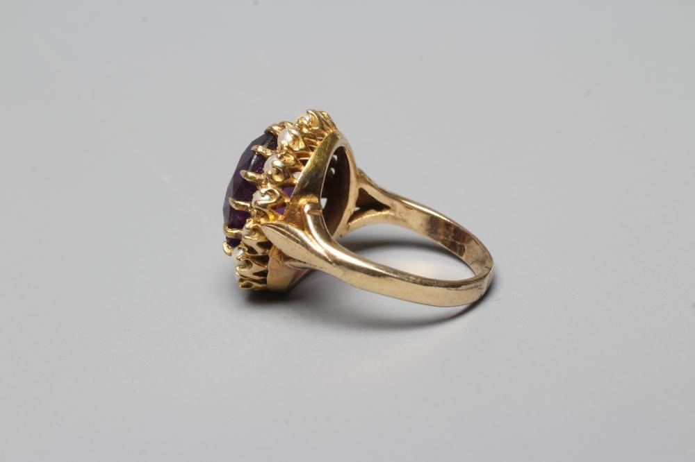 AN AMETHYST AND SEED PEARL RING Image