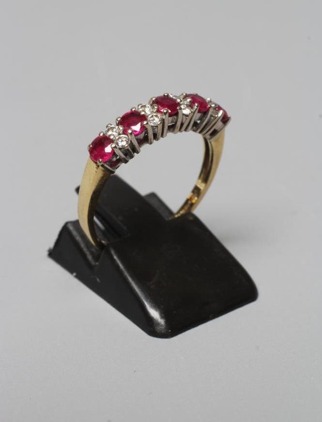 A RUBY AND DIAMOND HALF HOOP RING Image